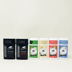 Six tubes of Green Beaver's aluminum-free antiperspirants sit on a beige background