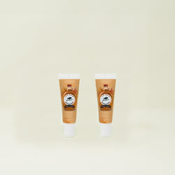 Two maple natural lip balms are on a beige background