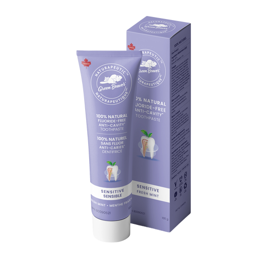 A purple tube and packaging of Naturapeutic sensitive teeth  fluoride-free toothpaste in fresh mint flavour by Green Beaver
