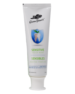 A white tube of sensitive teeth  flouride-free toothpaste in fresh mint flavour by Green Beaver